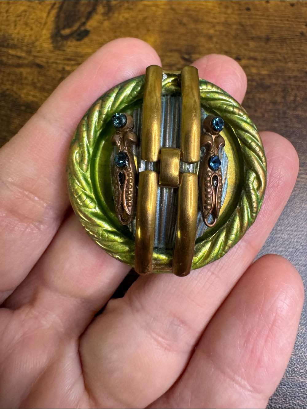 Vintage Green and Bronze Round Decorative Brooch with Blue Accents